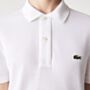 Lacoste Polo with two buttons in white with small crocodile logo